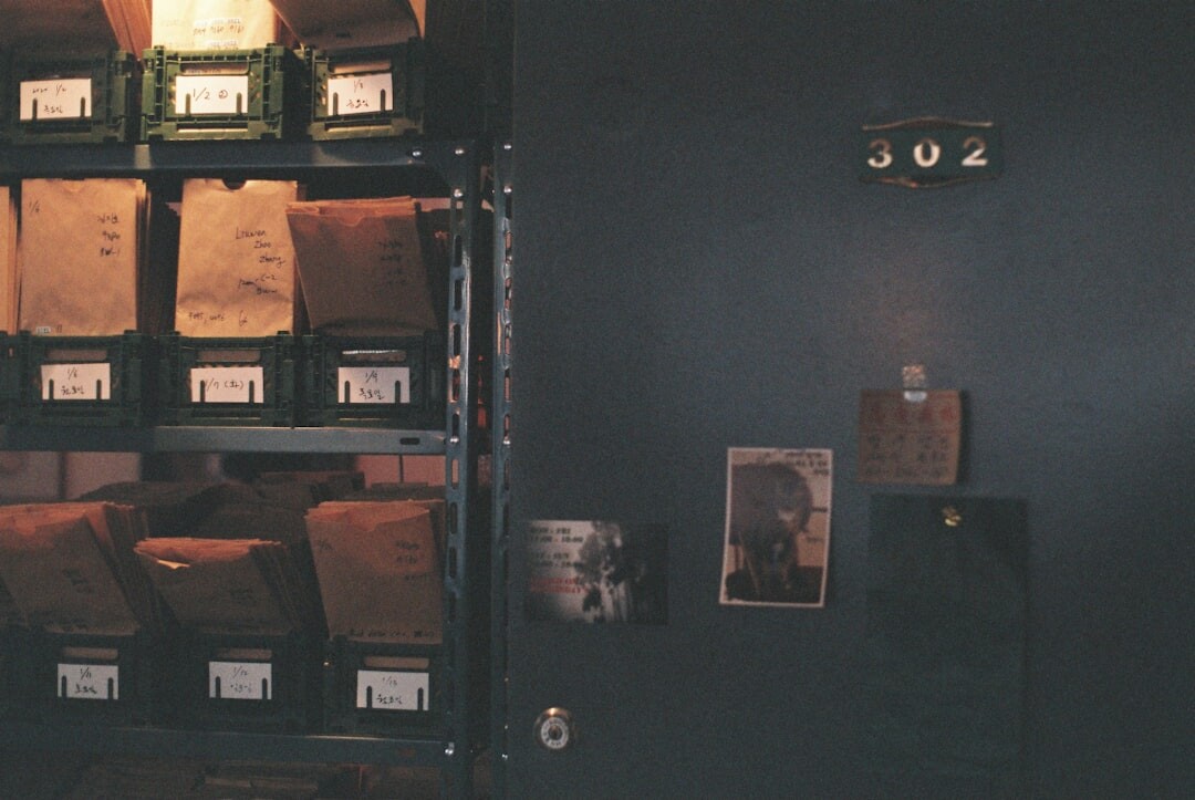 Old police archive room with filing cabinets and case files